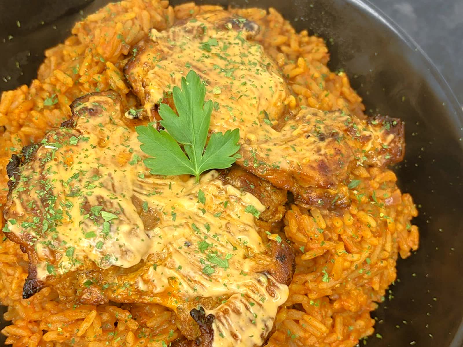 Party jollof rice with grilled chicken